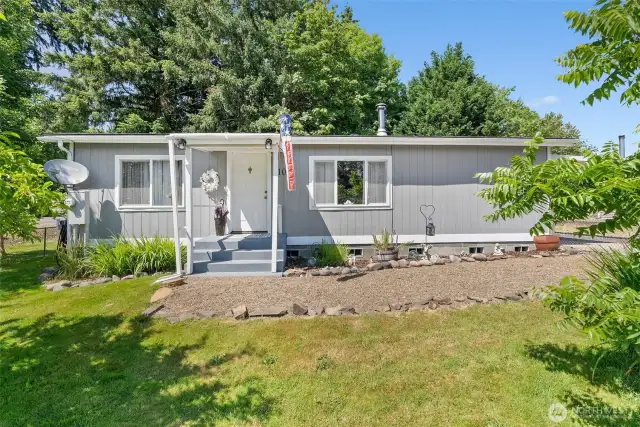 Surrounded by Lush PNW Landscape, the Gravel Path Leads to the Front Entry!