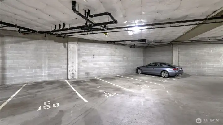 Two spots side by side in secured garage. 148 and 149.