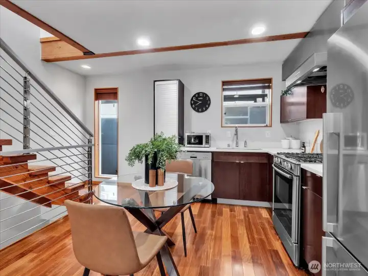 Open kitchen and dining keeps everyone together.