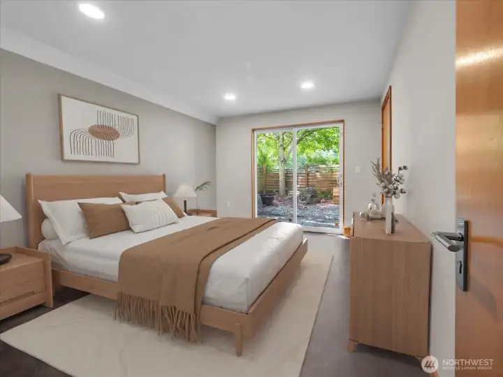 Downstairs bedroom, primary, or...? Photo virtually staged.