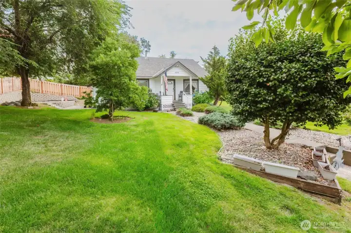 Set on a spacious and usable .58-acre lot, this inviting home blends vintage charm with modern updates—truly "Home Sweet Home" for first-time buyers or downsizers alike!