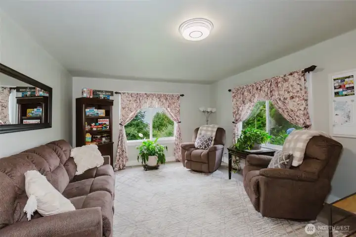 Major upgrades include a newer roof, new heat pump and forced air furnace (within the last year), and newer windows for year-round comfort and efficiency.