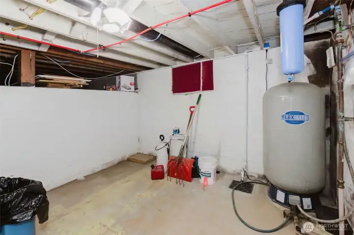 The small unfinished basement provides great storage and a mechanical room.