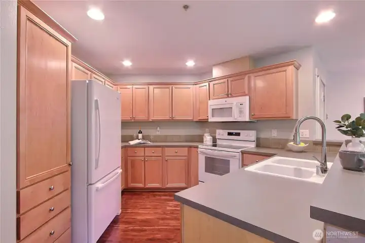 Functional kitchen layout with an abundance of cabinetry.