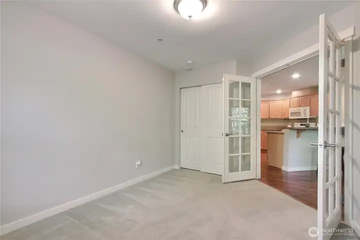 Den/bedroom with french doors.