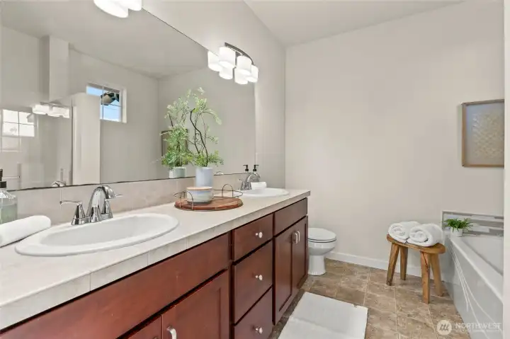 Double sink with plenty of storage space.