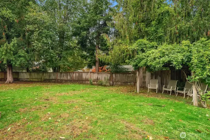 Sit under the trellis for shade!