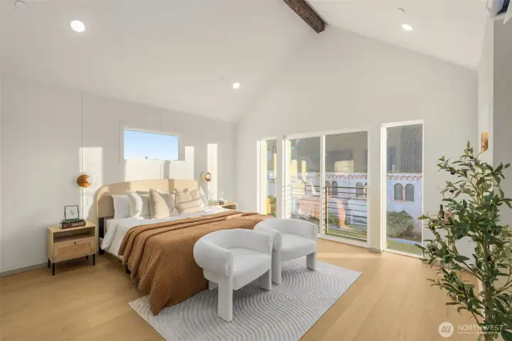 Serene primary suite featuring expansive floor-to-ceiling windows and a private balcony access.