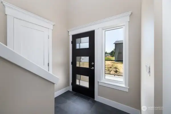Entry way To Home with tile floor