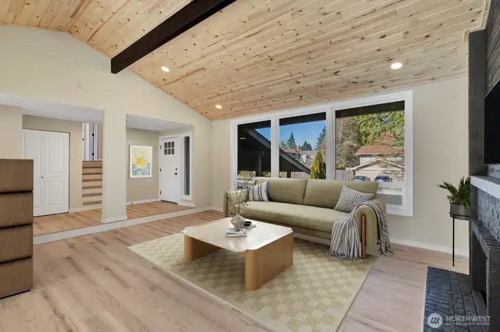 Another view of living room with TONS of natural light. Virtually staged