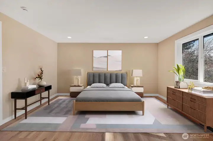 Very spacious primary bedroom with oversized window, new flooring, and brand new paint! Virtually staged