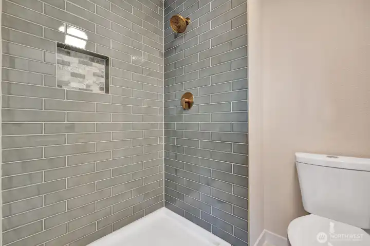 Primary bath shower has all new custom tile work!