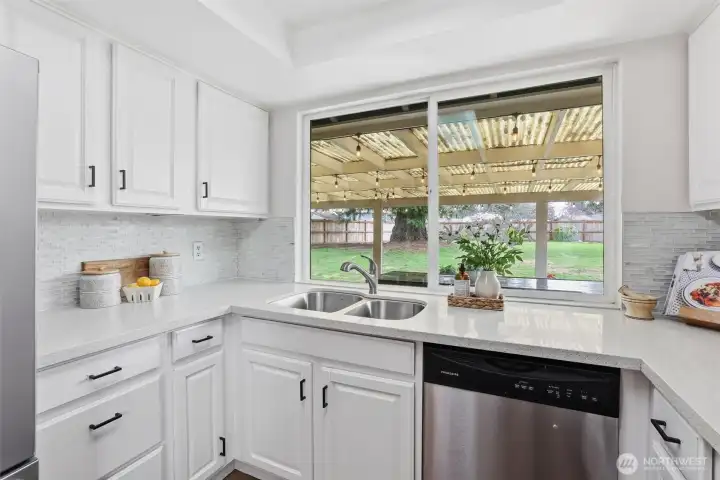 Homeowners loved the pass-through window from kitchen to patio when entertaining.