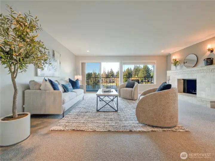 Expansive floor-to-ceiling glass walls invite the outdoors in, creating a living space that feels incredibly light, airy, and connected to the horizon.