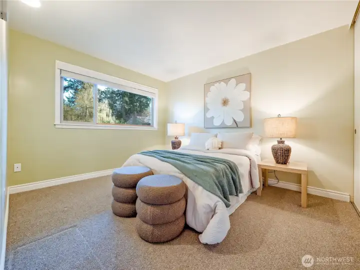 The updated secondary bathroom delivers polished finishes and cohesive design throughout.