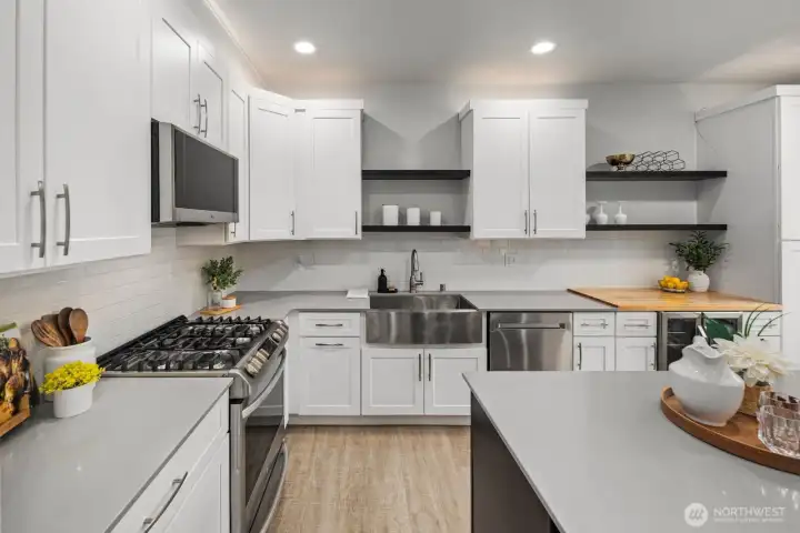Roomy kitchen has plenty of cabinet & counter space