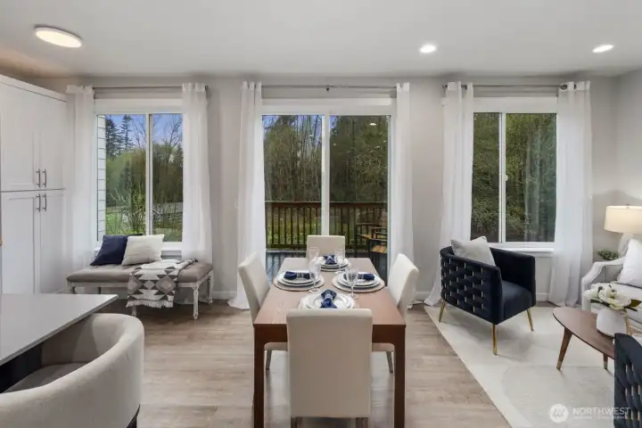 Dining area opens to kitchen and living room