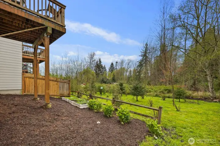 Grow your own fruits, veggies or flowers in the garden space in the backyard