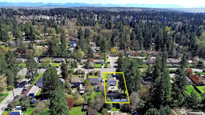 Aerial view facing East.  Potential neighboring assemblage is an ideal situation for a future developer.