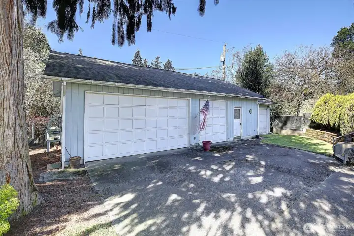 Large four car detached garage located on the back of the property.