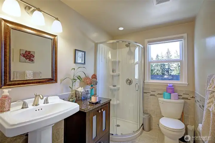 Spacious bathroom located just off the primary bedroom.