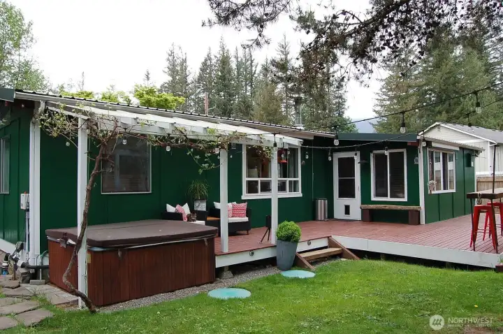 Covered deck and hot tub