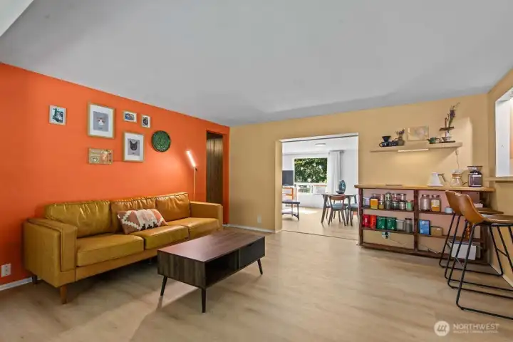 Additional living or entertaining space off of the kitchen and main entrance