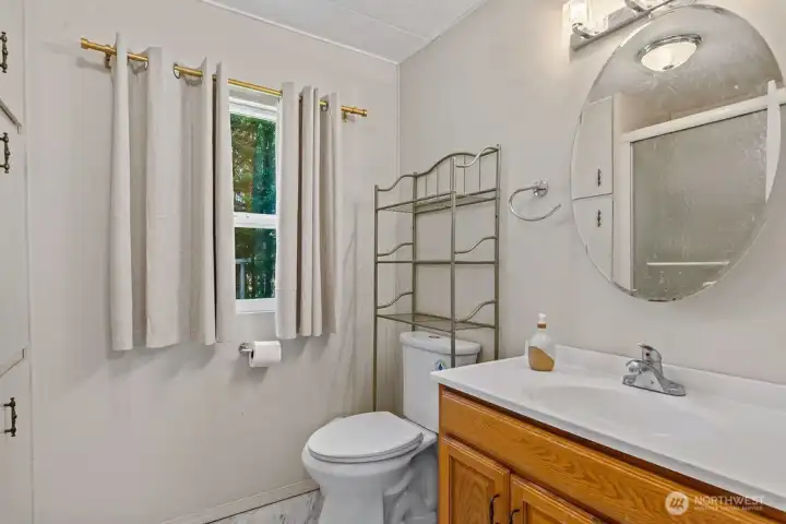 Ensuite bathroom connected to the primary bedroom