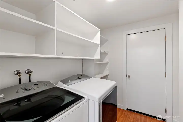 Laundry/mud room off of garage Laundry/mud room off of garage