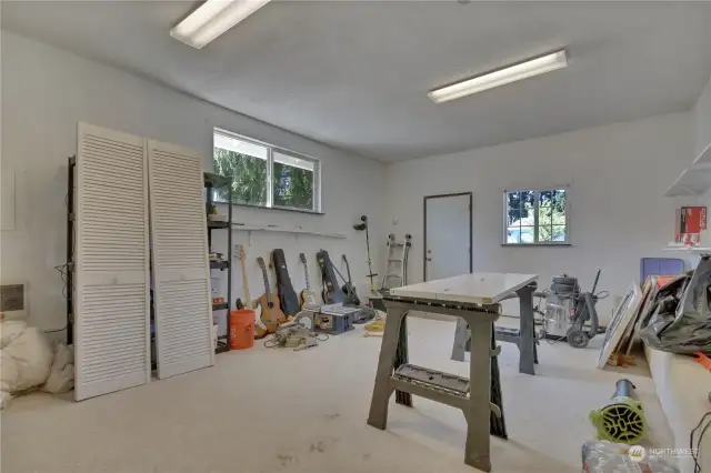 Converted garage as an extra living space. Currently used as a shop/storage area.