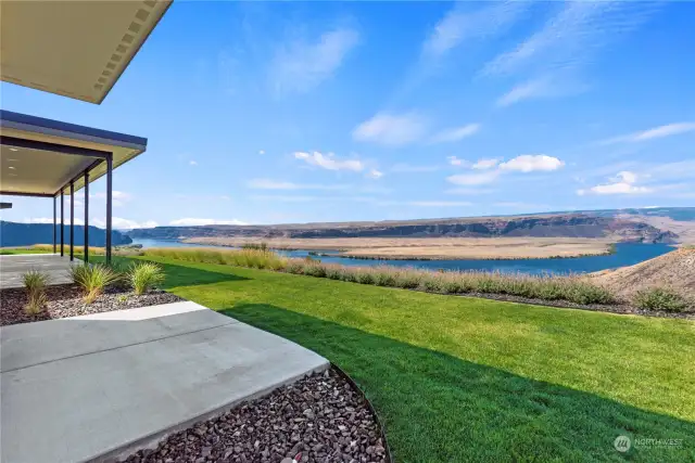 Welcome to Lot 22 at The Ranch, where breathtaking views await you! This exceptional home boasts a large covered patio that offers the perfect vantage point to soak in the 180-degree Columbia River views!