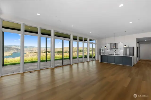 As you step inside, be greeted by a grand great room boasting 10'6" ceilings and magnificent floor-to-ceiling windows that frame breathtaking views. The gourmet kitchen features top-of-the-line Thermador Masterpiece Collection appliances!