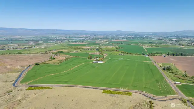 This expansive 158-acre farm features a home set in the middle of the property, offering unmatched privacy and stunning views. With flat, open land surrounding the home, the possibilities are endless—perfect for farming, ranching, or future development.