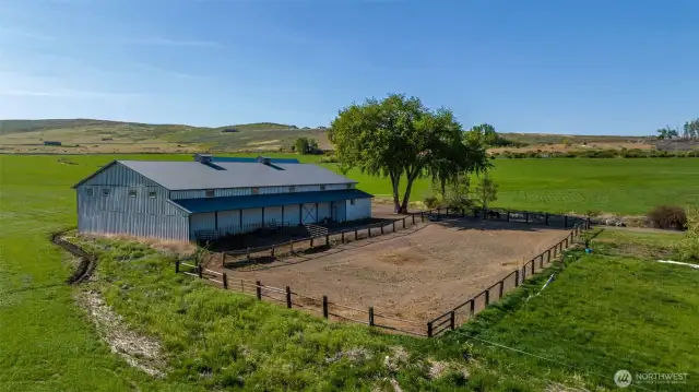 Exterior of the indoor arena and paddock. Room for 4 additional stalls. Indoor arena measures 70' x 120'.