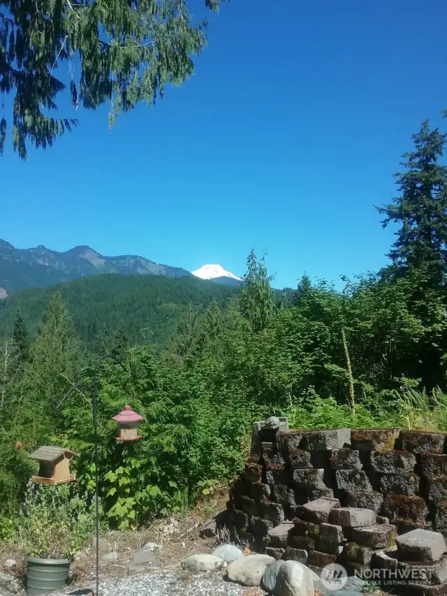 Seller supplied photo with clear skies - Mt. baker from back yard