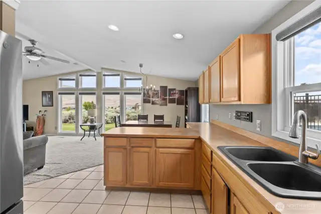 Kitchen open to dining room and living room.