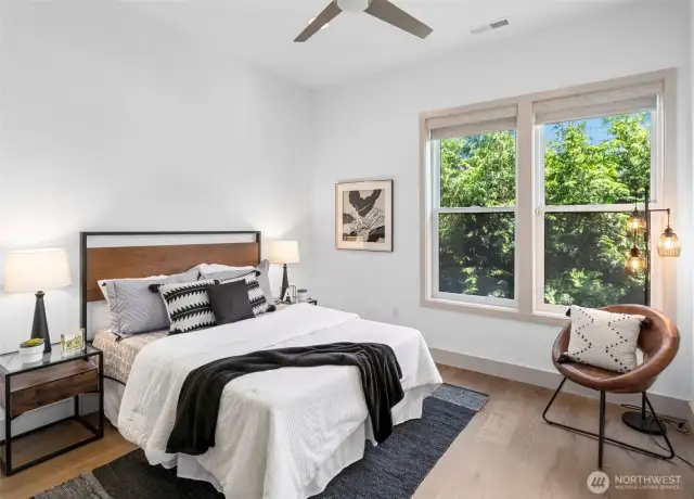Main-floor bedroom with peaceful, green outlooks.