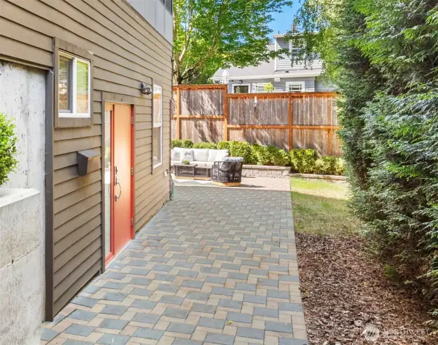 Private entrance to the lower level enhances versatility.