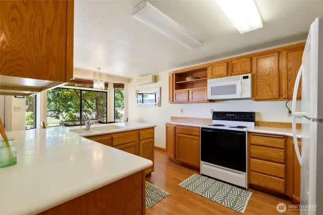 large kitchen with plenty of cabinet and counter space.