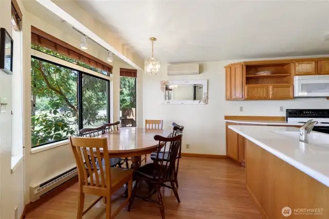 Your kitchen has a view of the water with large windows and plenty of sunlight.