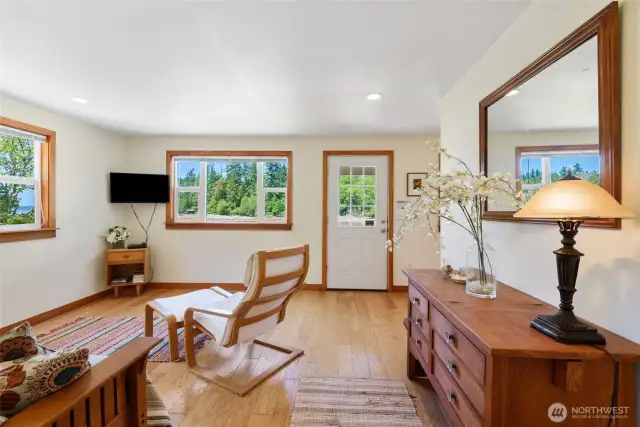 Enjoy the bright sitting room with views facing the water.