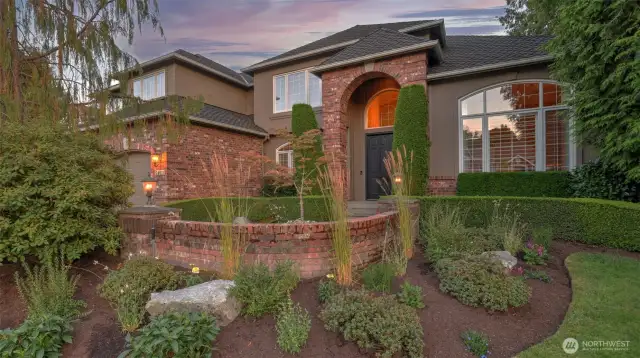This thoughtful floor plan features the primary suite on the main level offering ease of living & long term convenience.
