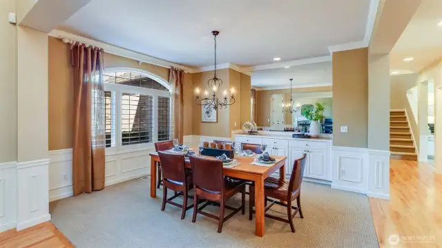 Dining space complete with marble-topped butler's serving area for ease of entertaining
