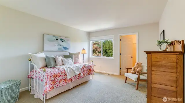 First of three secondary bedrooms with spacious walk-in closet