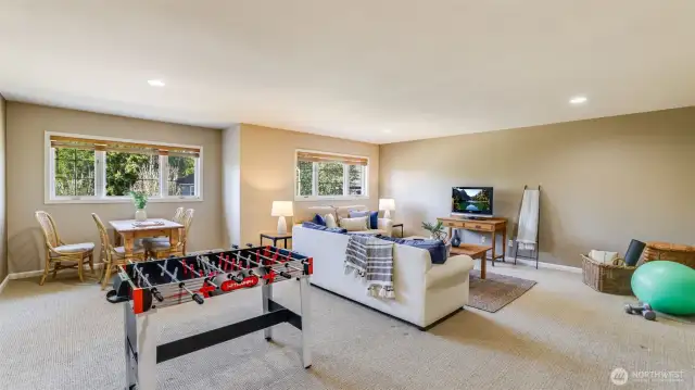 Expansive bonus room found at the top of second staircase