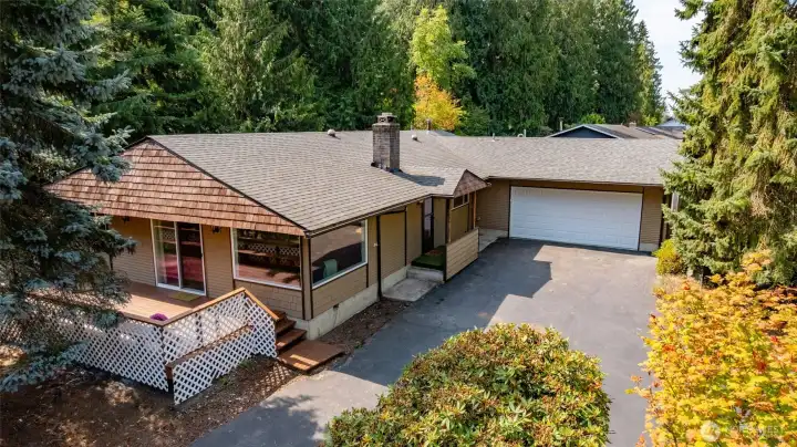 Comfortable rambler in the Thunderbird neighborhood of Mt. Vernon. it is wrapped in greenery with a huge yard.