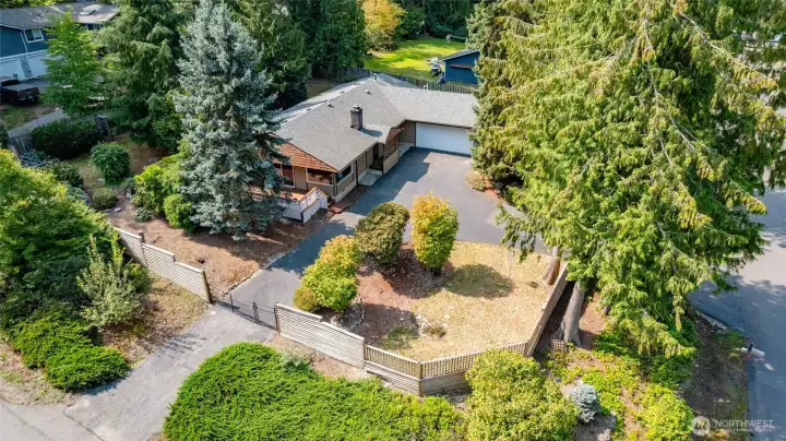 This corner lot has 3 gates for easy access all over the property. The roof was installed new in 2018.
