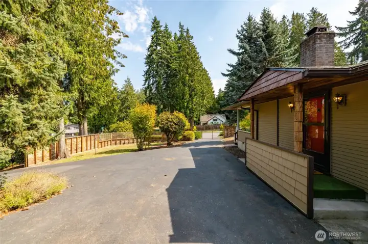 There is a large approach area to the front of the house and the garage. It is paved and well sealed.