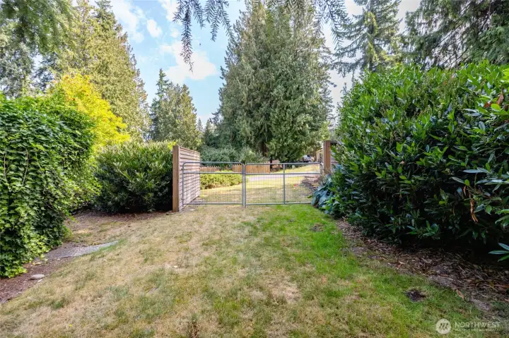 The 2nd gate off 30th St, where you could back in a boat, or RV, or just have easy access for landscaping.