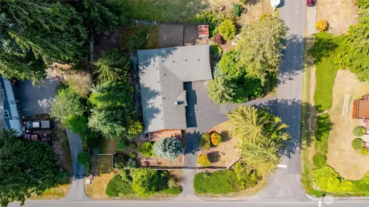 The roof was completely replaced including sheeting and shingles in 2018. Beautiful corner lot.